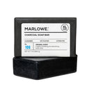 MARLOWE charcoal exfoliating soap bar with a dark, textured surface, highlighting its natural ingredients and cleansing benefits.