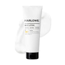 Marlowe Santal body lotion in 8 oz bottle, creamy texture and warm sandalwood scent, shown in a sleek white container.