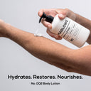 MARLOWE. body lotion bottle, smooth texture, with natural ingredients, showcasing the product's moisturizing benefits.