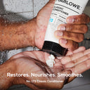 MARLOWE. hair conditioner bottle showing classic formula, smooth and shiny hair benefits, with a clean, minimalist design.