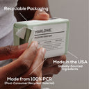 MARLOWE lightly exfoliating neroli soap bar with natural packaging, showcasing its textured surface and elegant design.