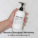 MARLOWE. Original Sage and Fir body wash with natural ingredients, showing a bottle with fresh sage and fir branches.