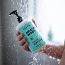 MARLOWE Morning Wood Danny Body Wash in a pump bottle, lathered on a shower sponge, ready for a refreshing cleanse.