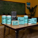 Danny MARLOWE Morning Head Conditioner bottle with label, shown in a lineup of hair care products.