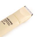 Set of two MARLOWE hair trimmer blades with a sand-colored finish, designed for precise grooming and trimming.